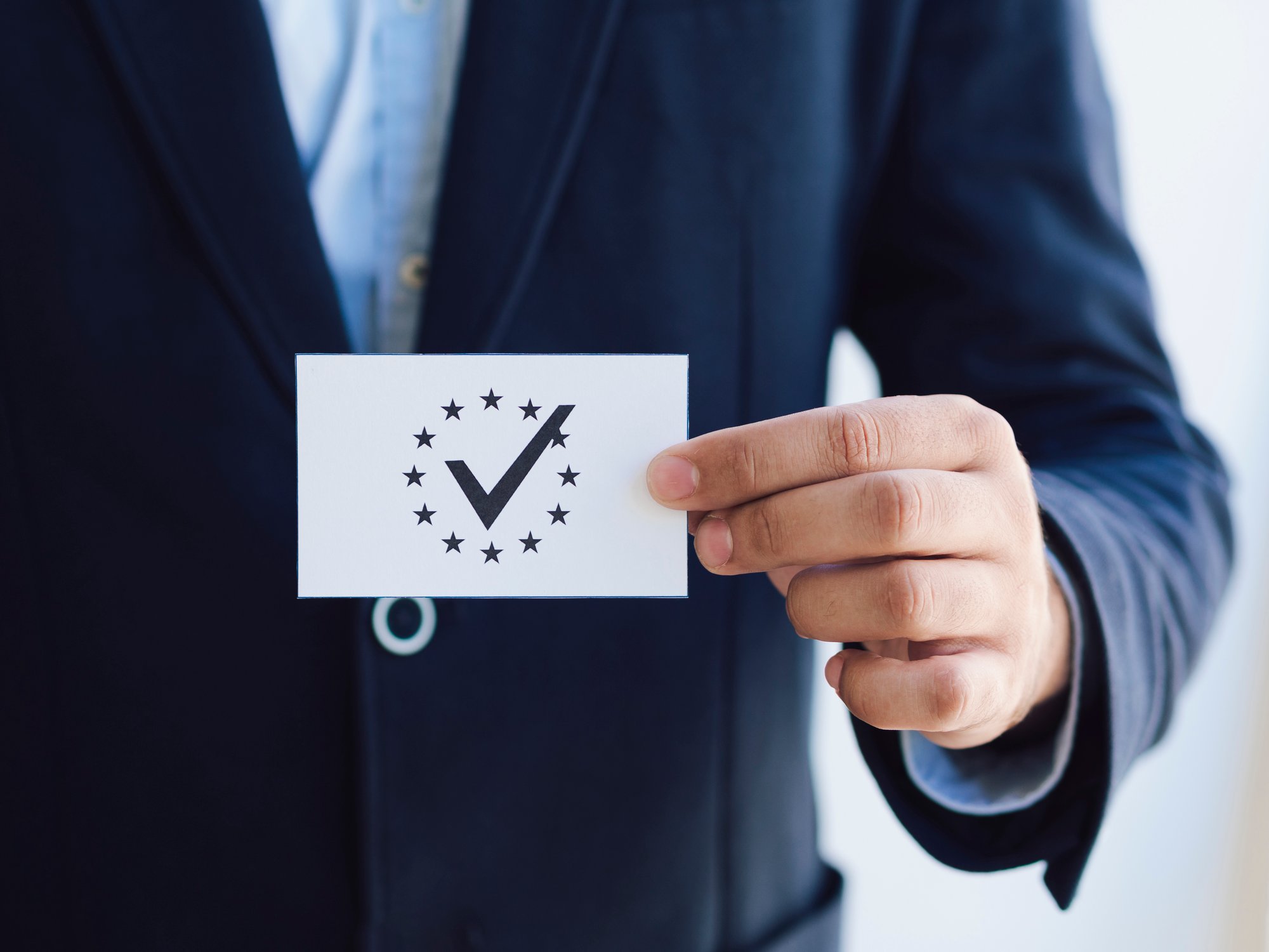 front-view-man-holding-ballot